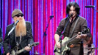 ZZ Top’s Billy Gibbons performing onstage with Jack White in 2006