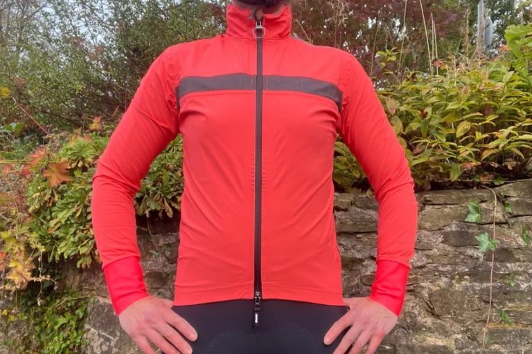 Image shows a rider wearing the Santini Guard Neos Jacket in red