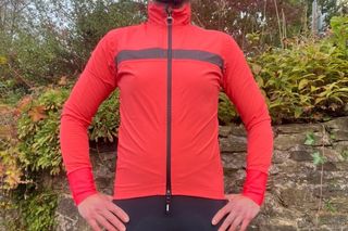 Image shows a rider wearing the Santini Guard Neos Jacket in red