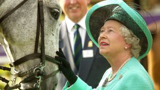 Queen Elizabeth II attends the third day of the Royal Windsor Horse Show at Home Park on May 15, 2004 in Windsor, England.