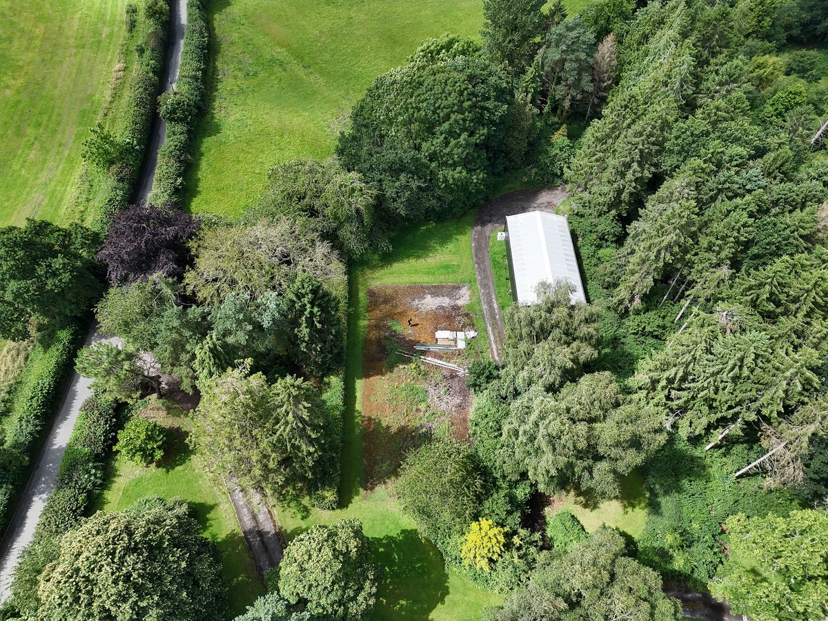 DJI Air 3 aerial photo of rural farmland on a sunny day with the 24mm wide camera