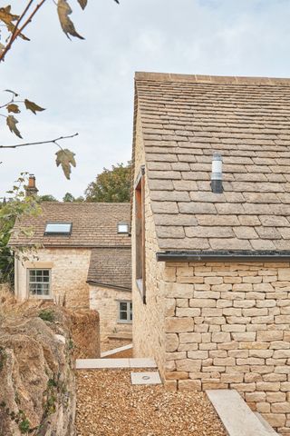 close up of dry stone walling on exterior of extension