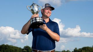 Trey Mullinax with the Barbasol Championship trophy