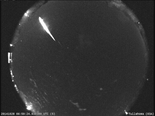 A brilliant fireball from the Taurid meteor shower lights up the night sky over a NASA Marshall Space Flight Center camera in Tullahoma, Tennessee on Oct. 28, 2014.