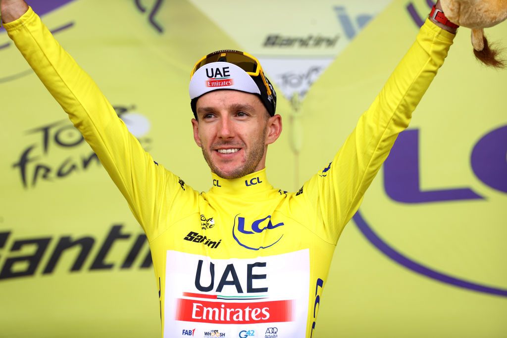 NOGARO FRANCE JULY 04 Adam Yates of United Kingdom and UAE Team Emirates Yellow Leader Jersey celebrates at podium during the stage four of the 110th Tour de France 2023 a 1818km stage from Dax to Nogaro UCIWT on July 04 2023 in Nogaro France Photo by Michael SteeleGetty Images