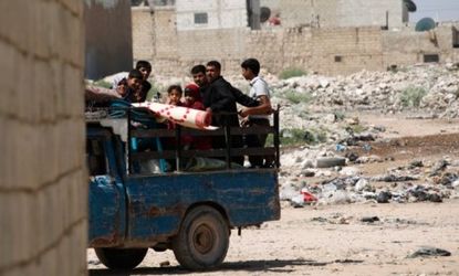 Civilians flee from Aleppo's Bab al-Nayrab district Aug. 27: If the Syrian rebels can unite, France will recognize it as a provisional government.