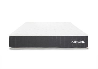 The Allswell mattress photographed with its white cover and grey edges