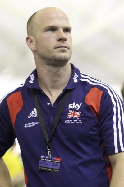Jan Van Eiden watches Pendleton walk out onto the track for sprint semi against Meares.