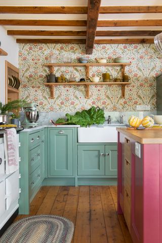 Green country kitchen with Morris & Co Seasons by May wallpaper