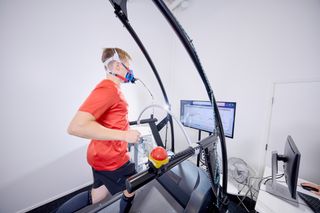 Man running on treadmill area