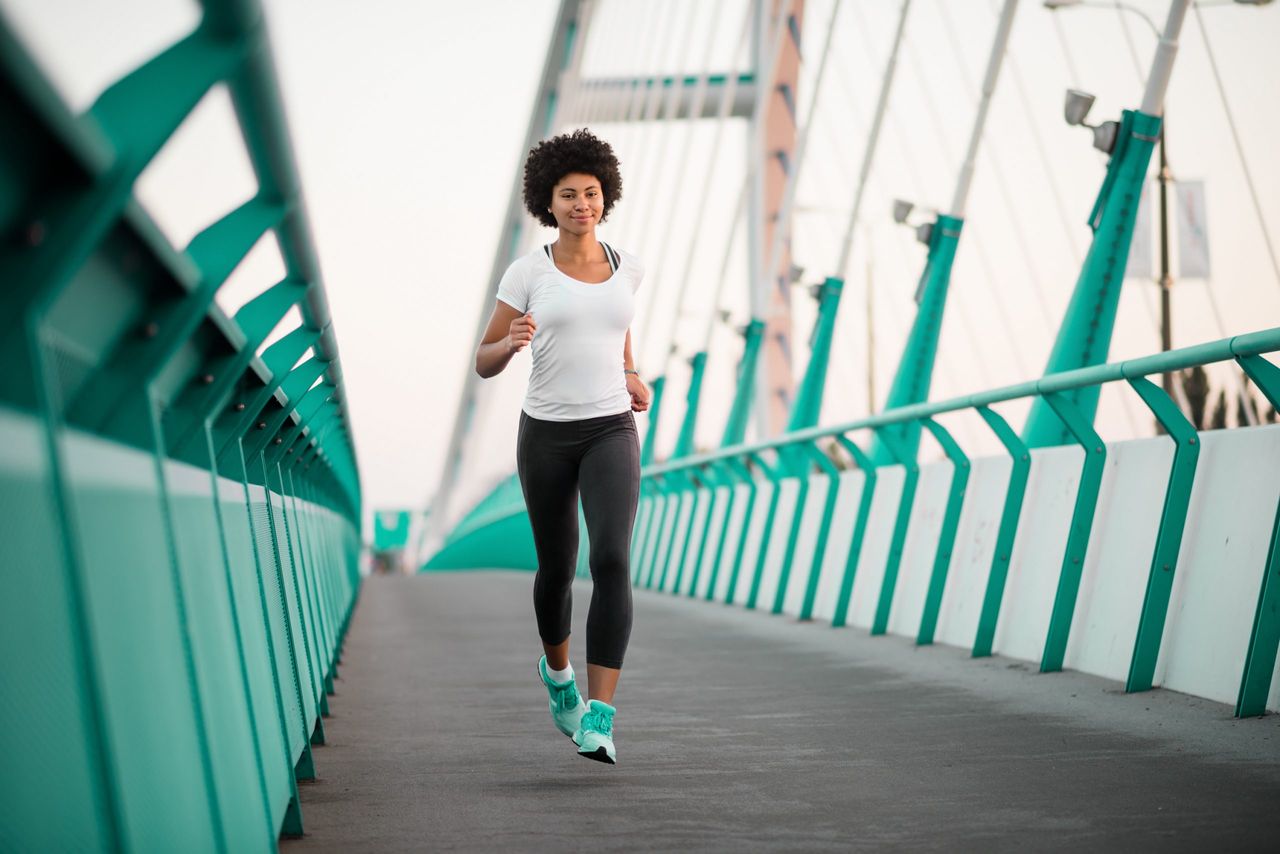 How long after eating can I exercise? Teen girl exercising on bridge