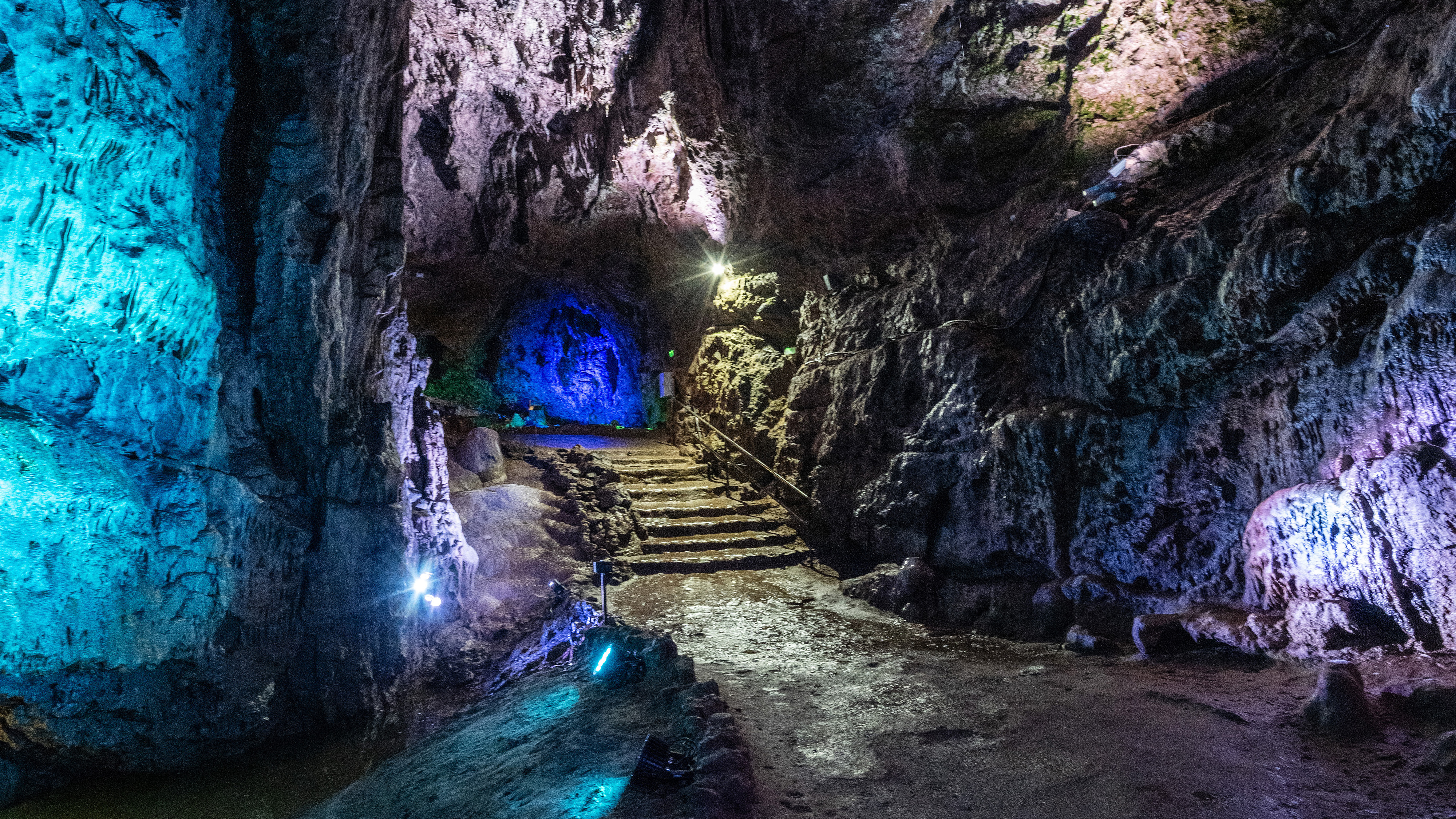 Pathway through cave system leading to exit tunnel