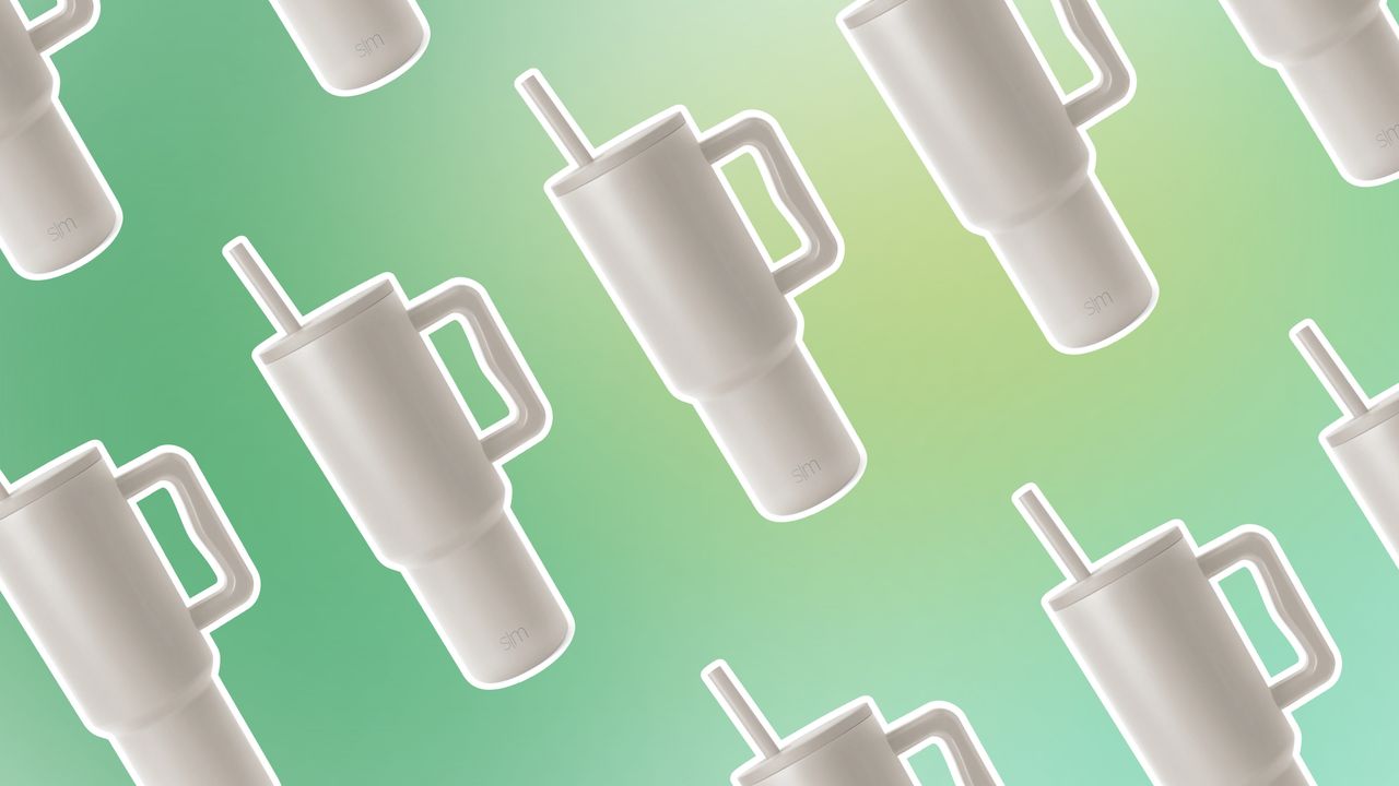 Gray travel mug repeating on green background