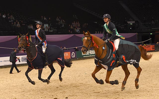 Emily Morris riding ULTIMATUM II owned by Emily Morris winner of the Bronze League Championship and Rachel Walker riding BO GI owned by Rachel Walker winner of the Silver League Championshipduring HOYS in the NEC in Warwickshire in the UK on 5th October 2016