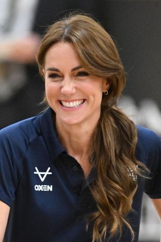 Kate Middleton headshot with a side ponytail hairstyle