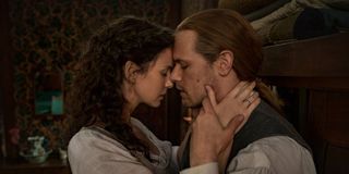 claire and jamie looking lovingly at each other in Outlander Season 6