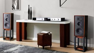 Wharfedale Super Linton either side of a desk in a modern living space