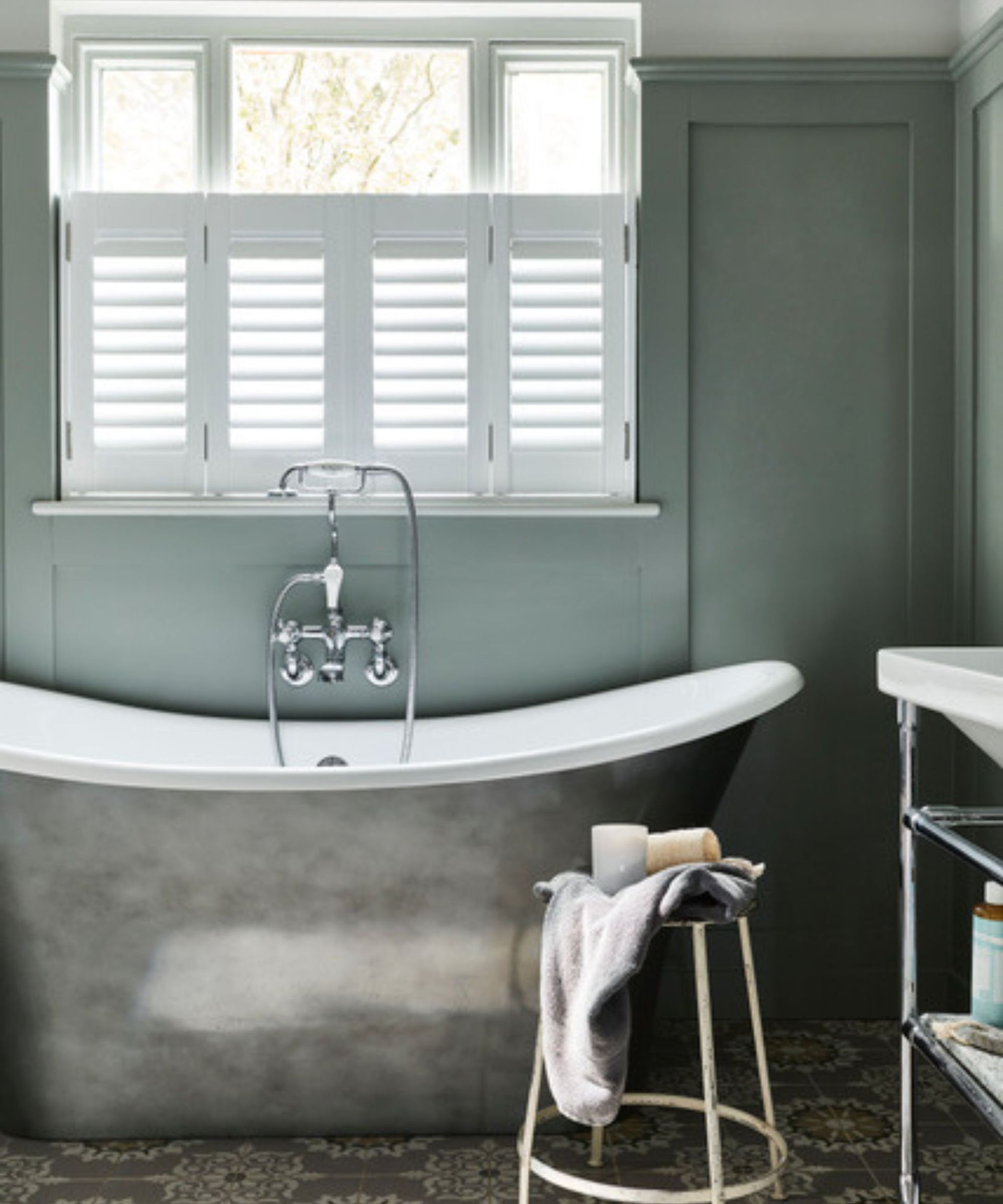 White shutters on a bathroom window