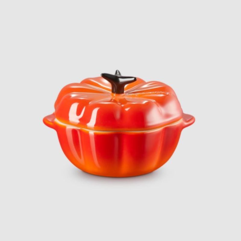 An orange coloured Le Creuset Stoneware Pumpkin Casserole dish is a smaller and cheaper alternative to the Le Creuset Cast Iron Pumpkin Casserole.