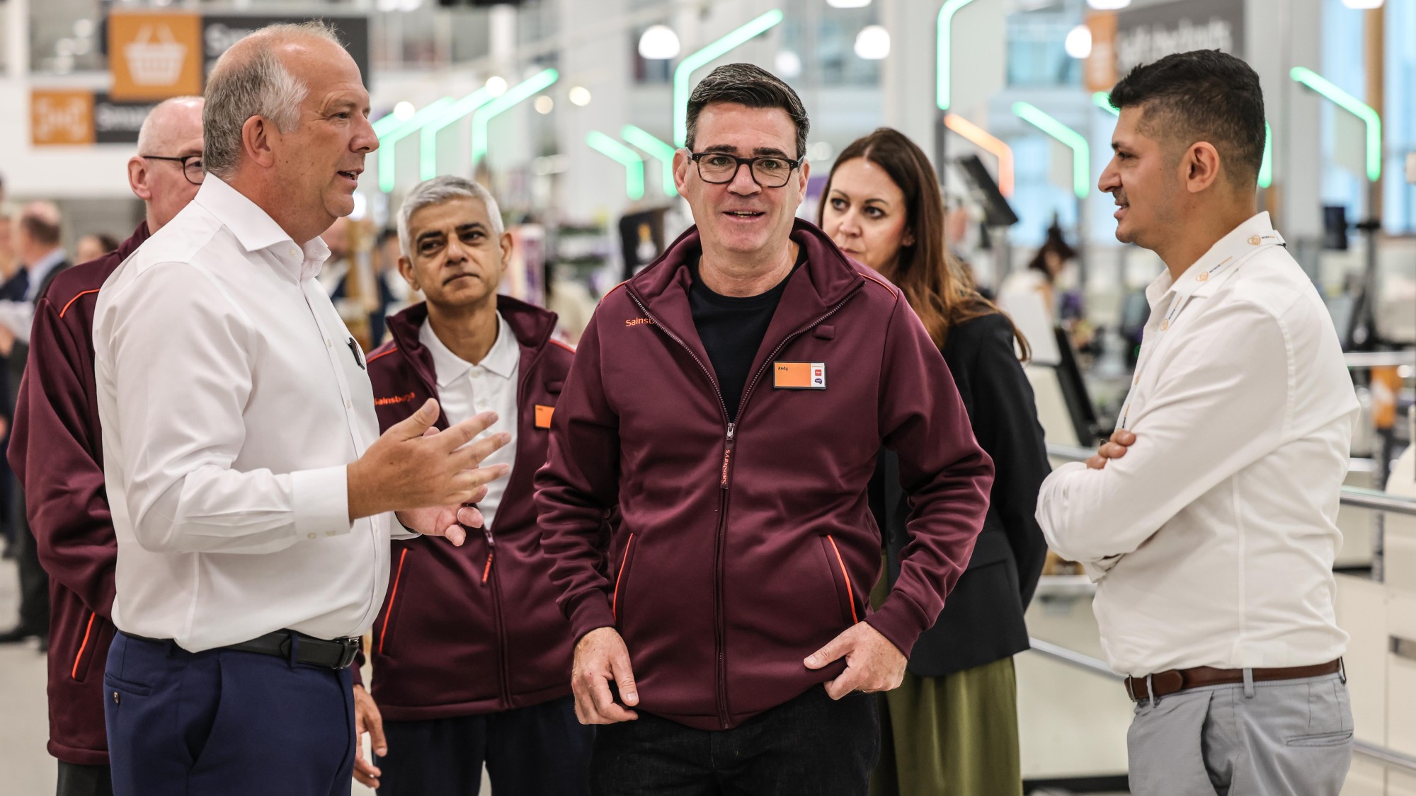 Andy Burnham and Sadiq Khan wear Sainsbury&rsquo;s uniforms in a store in Nine Elms