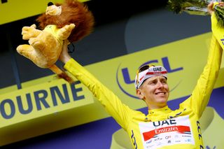 LIBOURNE FRANCE JULY 16 Tadej Pogaar of Slovenia and UAETeam Emirates yellow leader jersey celebrates at podium during the 108th Tour de France 2021 Stage 19 a 207km stage from Mourenx to Libourne Lion Mascot LeTour TDF2021 on July 16 2021 in Libourne France Photo by Tim de WaeleGetty Images
