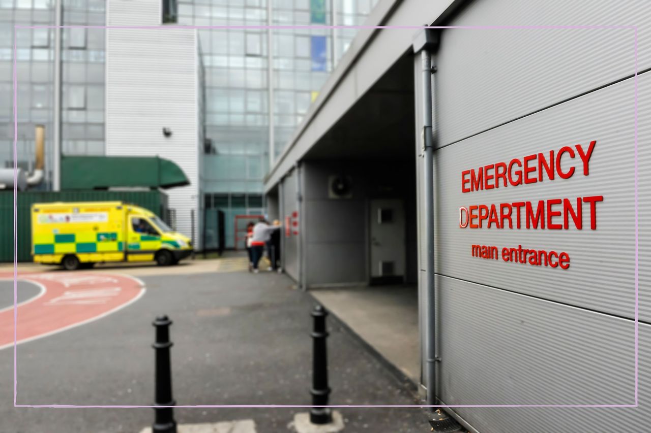 A close up of a sign reading &#039;emergency department&#039; with an ambulance in the background