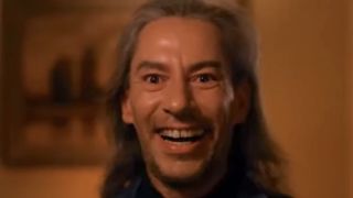 Close-up of Bob laughing in the mirror during Leland Palmer transition in Twin Peaks