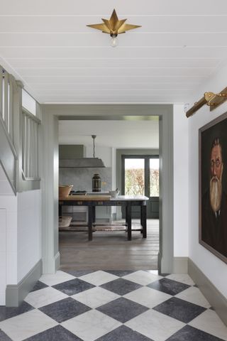 Hallway with grey and white checkerboard flooring