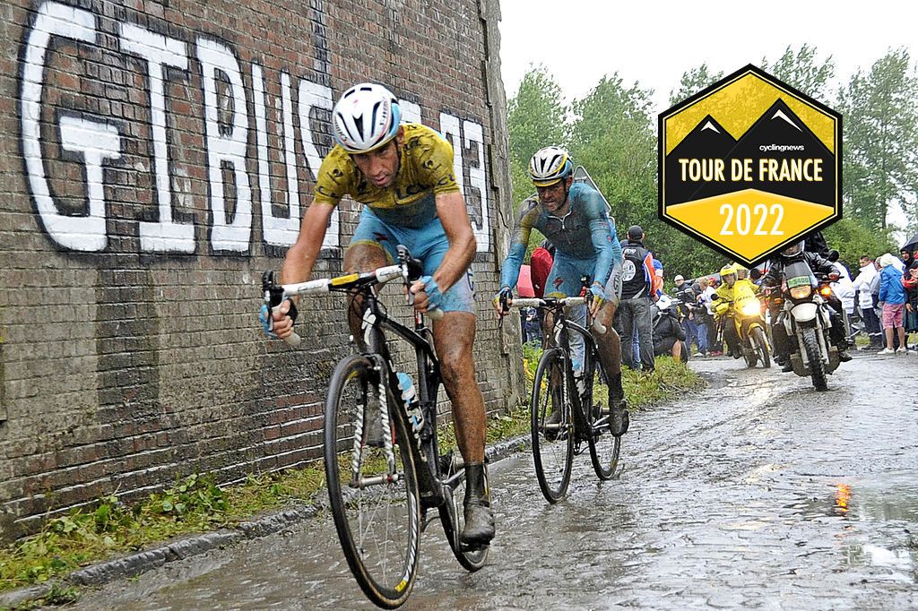 Italys Vincenzo Nibali L wearing the overall leaders yellow jersey rides during the 1525 km fifth stage of the 101st edition of the Tour de France cycling race on July 9 2014 between Ypres northwestern Belgium and Arenberg Porte du Hainaut in Wallers northern France AFP PHOTO FRANCOIS LO PRESTI Photo credit should read FRANCOIS LO PRESTIAFP via Getty Images