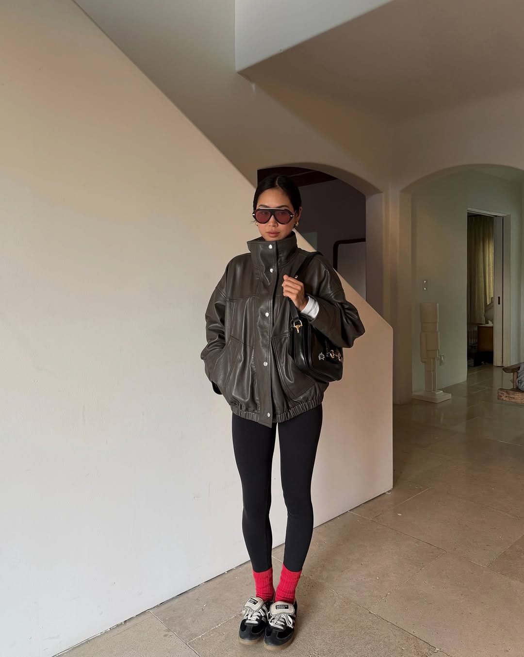 woman wearing sneaker outfit idea 2026