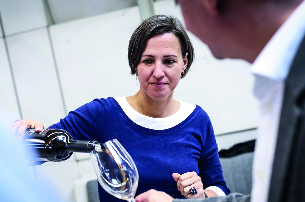 Mateja Gravner pouring wine