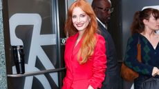 Jessica Chastain in New York City wearing a red suit