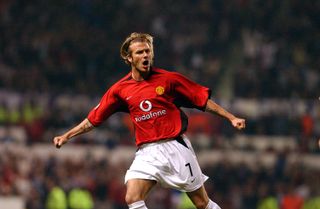 David Beckham celebrates after scoring for Manchester United against Real Madrid in the Champions League in 2003.