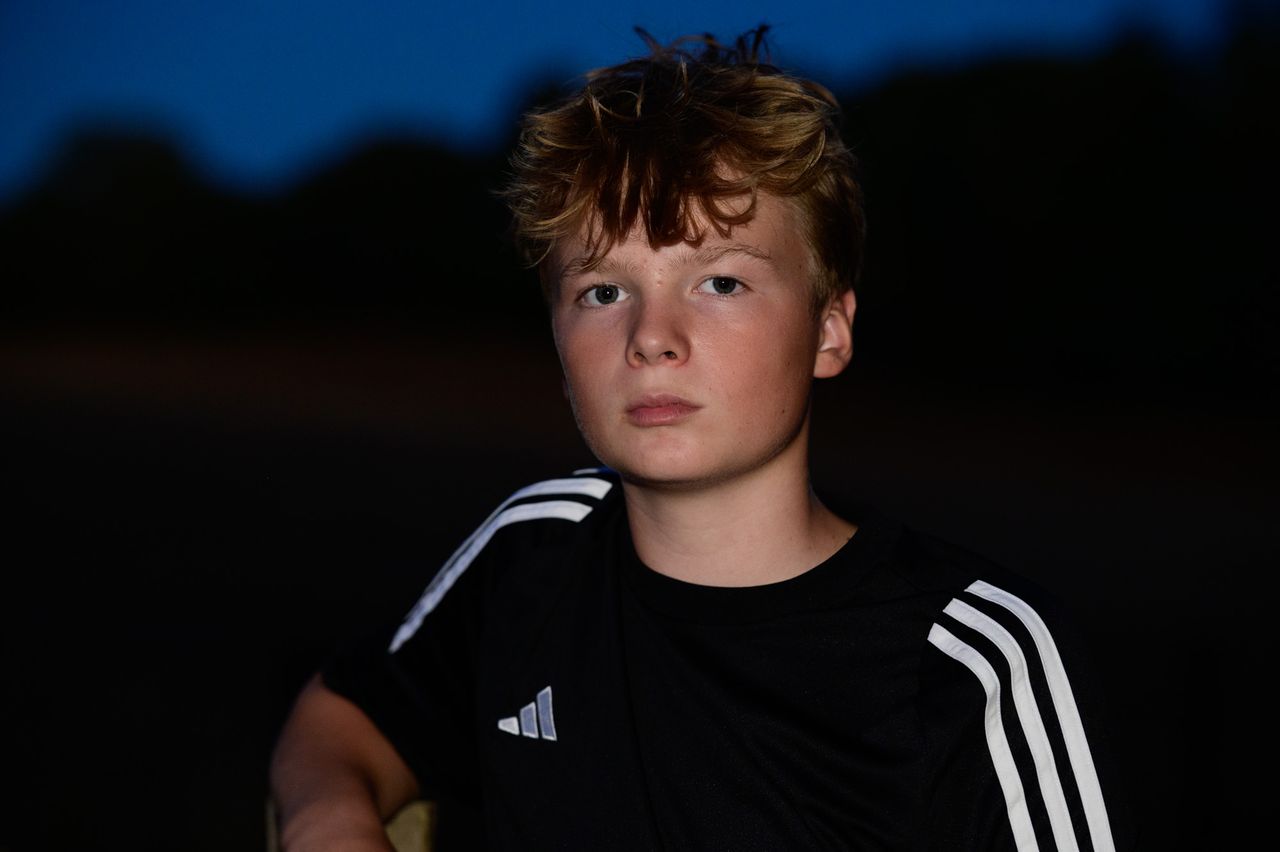 Low light portrait illuminated with the Godox iT32 camera flash