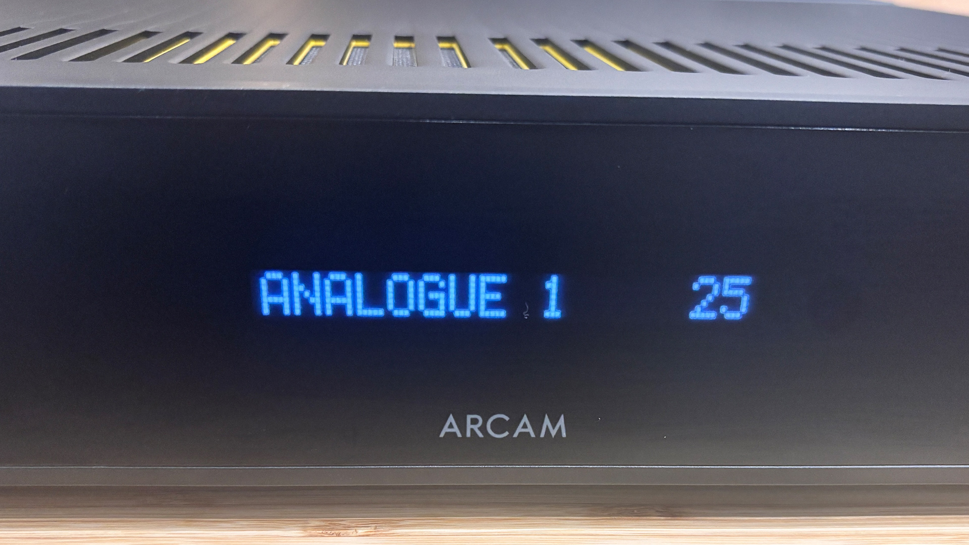 Arcam A5+ integrated amplifier detail of front display which shows 'Analogue 1 25'