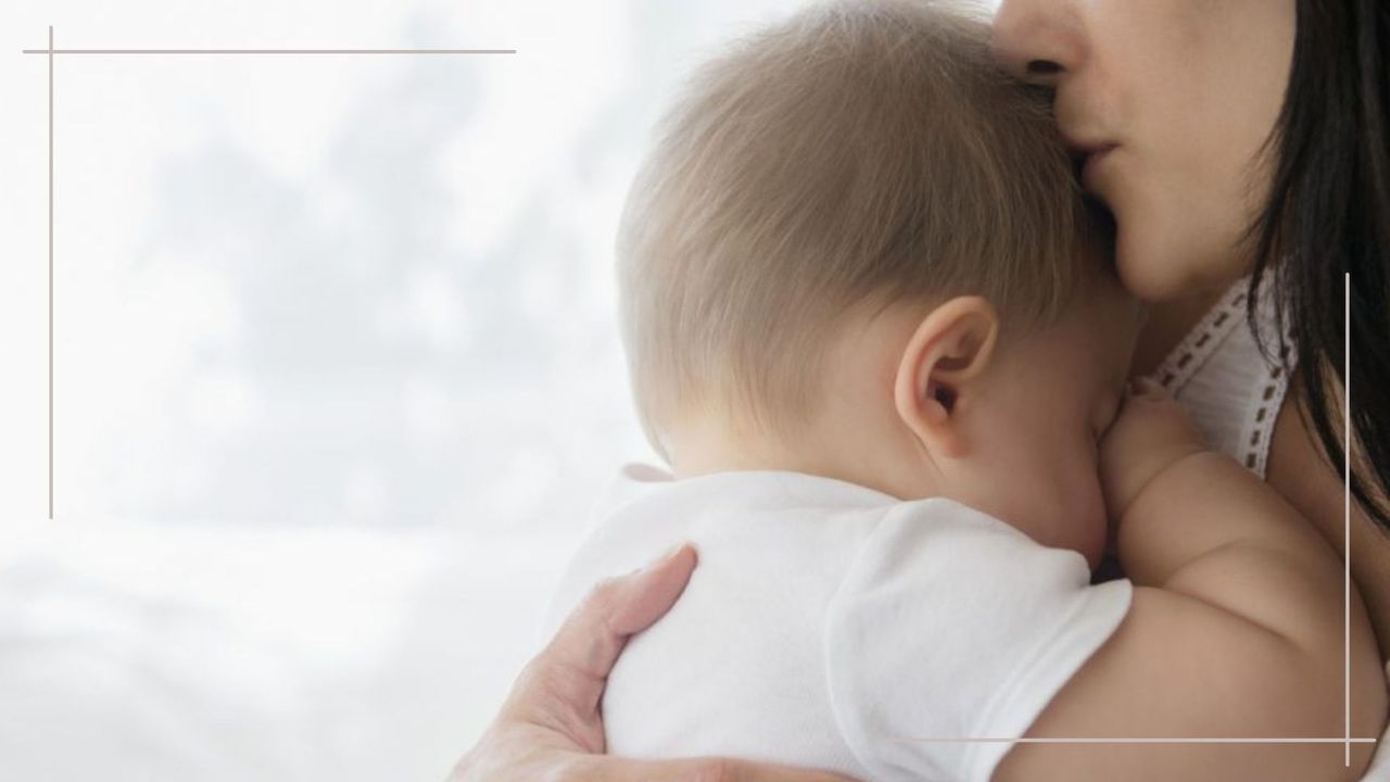 image of a mum and baby with back to camera to illustrate breastfeeding thrush