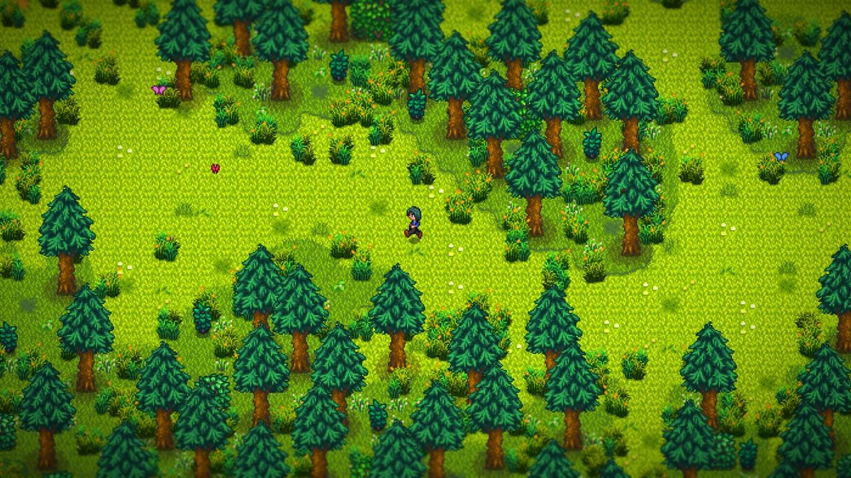 Stardew Valley Expanded screenshot showcasing a green pixel-style area with pine trees and scattered leafy bushes