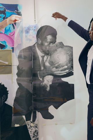 Kudzanai-Violet Hwami holds a transparency print, used for screen printing called Bira, which formed part of a solo exhibition shown at the Gasworks in London 2019