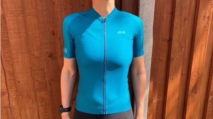 Female cyclist wearing the dhb Aeron Lab Raceline Women's Short Sleeve Jersey 3.0