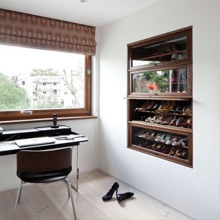 home office with shoe rack and wooden floor