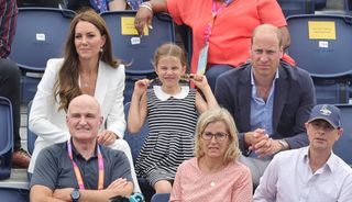 Catherine, Duchess of Cambridge, Princess Charlotte of Cambridge and Prince William, Duke of Cambridge watching a Hockey match between England and India at the University of Birmingham, Selly Oak during the 2022 Commonwealth Games on August 02, 2022 in Birmingham, England