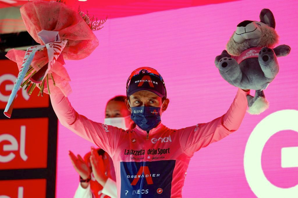 Overall leader Ineos Grenadiers rider Egan Bernal celebrates on the podium stage 12 of the Giro d&#039;Italia 2021