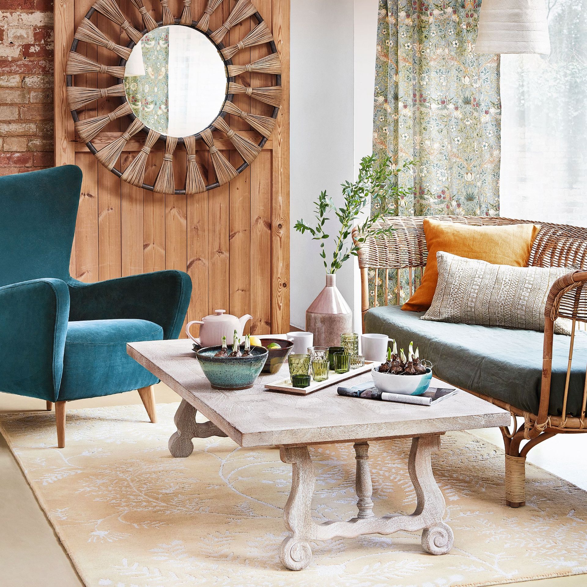 The viral 'blue sofa' controversy dividing social media - Ideal Home 29 Wood interiors living room with blue armchair, sofa, and light coloured coffee table