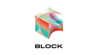 A stylised cube with marbled colour sits on a white background, with the word 'BLOCK' beneath