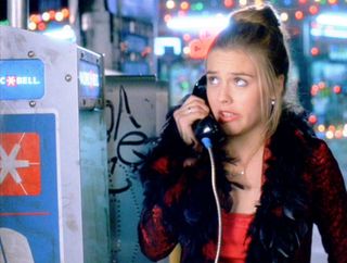 Cher Horowitz (Alicia Silverstone) wearing her Alia jacket while using a pay phone