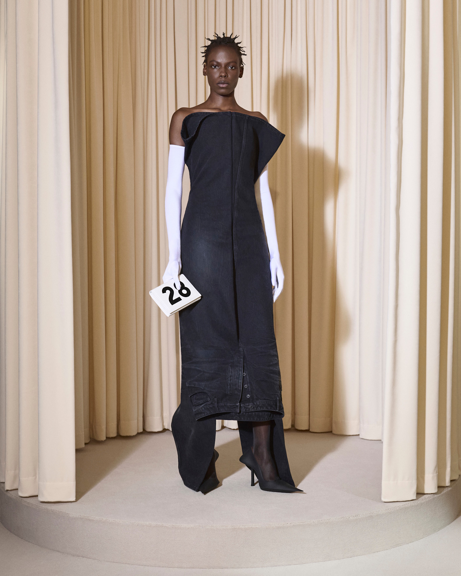 A model wore Campbell's denim dress in the Balenciaga Couture 2024 show
