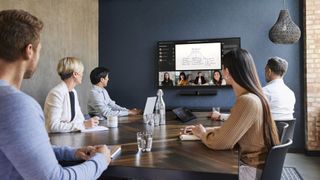 A videoconference in a room using Jabra technology.