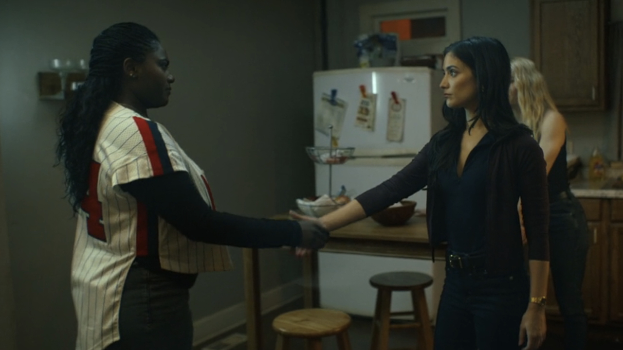 Adebayo and Bordeaux shaking hands in Peacemaker Season 2 finale