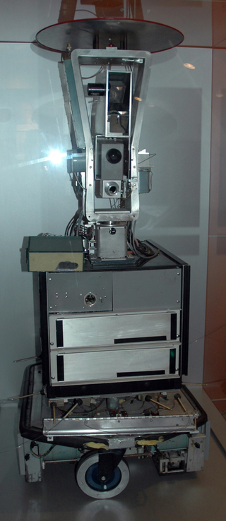 A photo of Shakey the Robot in its case at the Computer History Museum.