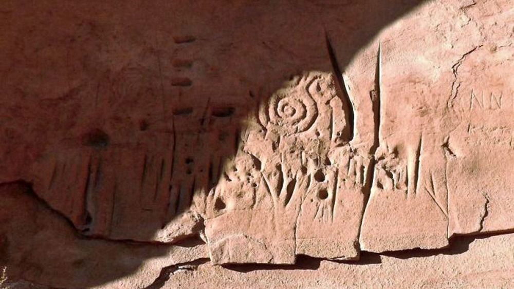 The spiral patterns that appear prominently in the rock carvings are thought to be a symbol among ancestral Pueblo peoples for the sky or the sun.